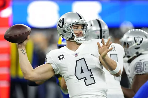Las Vegas Raiders quarterback Derek Carr throws a pass during the first half of an NFL football game against the Los Angeles Rams, Dec. 8, 2022, in Inglewood, Calif. Carr said he will not extend the Feb. 15, 2023, deadline to help facilitate a trade from the Raiders. (AP Photo/Mark J. Terrill, File)