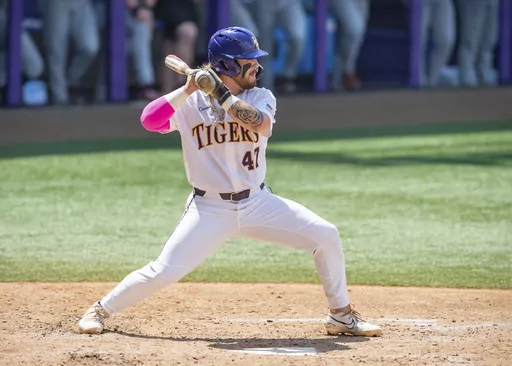 LSU's Tommy White stands at the plate during an NCAA college baseball tournament regional game against Oregon State in Baton Rouge, La., Sunday, June 4, 2023. (Scott Clause/The Daily Advertiser via AP)