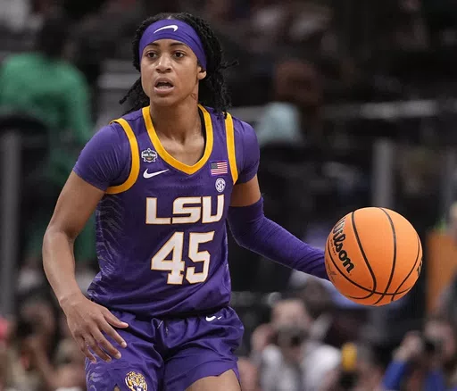 LSU's Alexis Morris controls the ball during an NCAA Women's Final Four semifinal basketball game against Virginia Tech, March 31, 2023, in Dallas. Former LSU star Morris knows firsthand how hard it is to make a WNBA roster. The guard was drafted in the second round by the Connecticut Sun a few weeks after helping the Tigers win their first championships in 2023, but was cut before the season started. (AP Photo/Darron Cummings, File)