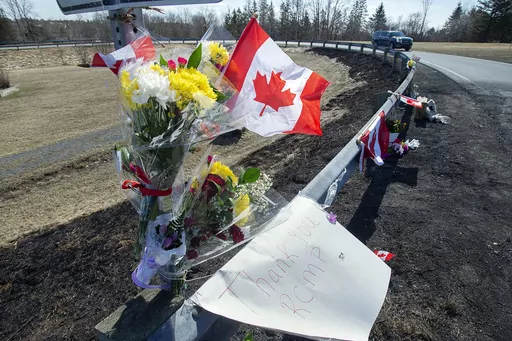 A memorial pays tribute to Royal Canadian Mounted Police Constable Heidi Stevenson, a mother of two and a 23-year veteran of the force, along the highway in Shubenacadie, Nova Scotia, on Tuesday, April 21, 2020. A public inquiry has found widespread failures in how Canada’s federal police force responded to the country’s worst mass shooting, Thursday, March 30, 2023. It recommends that the government rethink the Royal Canadian Mounted Police’s central role in Canadian policing. (Andrew Vau