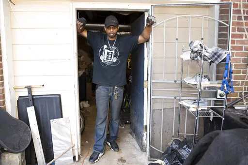 Prince Beatty is photographed on Monday, Jan. 10, 2022, in East Point, Ga.  Beatty, a 47-year-old Navy veteran, faces eviction this month for unpaid rent despite his landlord getting more than $20,000 in federal rental assistance.  (AP Photo/Hakim Wright Sr.)