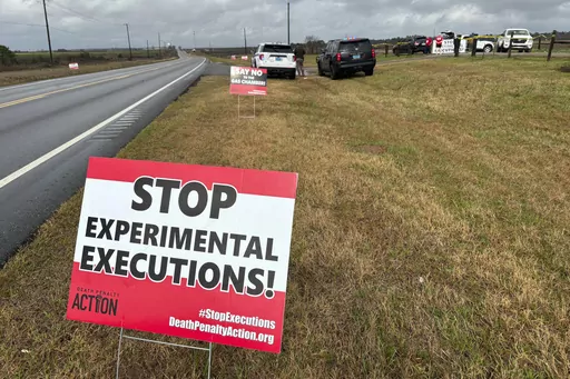 Anti-death penalty signs placed by activists stand along the road heading to Holman Correctional Facility in Atmore, Ala., ahead of the scheduled execution of Kenneth Eugene Smith, Thursday, Jan. 25, 2024. On Thursday, Alabama put Smith to death with nitrogen gas. (AP Photo/Kim Chandler, File)