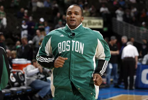 Boston Celtics forward Glen Davis warms up before facing the Denver Nuggets in the first quarter of an NBA basketball game in Denver on Monday, Feb. 23, 2009. Former Boston Celtics forward Glen “Big Baby” Davis was sentenced Thursday, May 9, 2024, to 40 months in a federal prison for his participation in a scheme that New York prosecutors said defrauded an insurance plan for NBA players and their families of more than $5 million.(AP Photo/David Zalubowski, File)