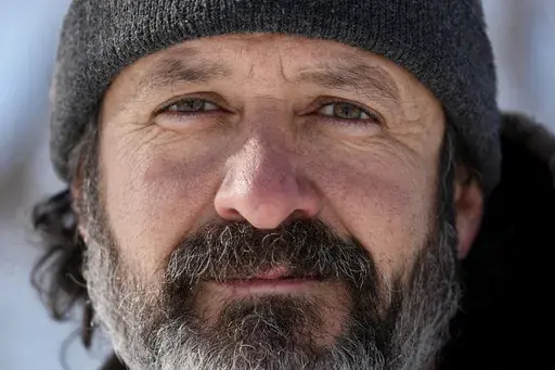 Eric Anderson, a biological science technician for the National Parks Service, who was fired last week poses for a photo Thursday, Feb. 20, 2025, in Chicago. (AP Photo/Nam Y. Huh)