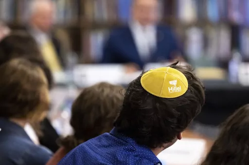 Samuel Winkler wears a Hillel kippah during a visit by Education Secretary Miguel Cardona to Towson University to discuss antisemitism on college campuses, Nov. 2, 2023, in Towson, Md. The Biden administration is warning U.S. schools and colleges that they must take immediate action to stop antisemitism and Islamophobia on their campuses, citing an “alarming rise” in threats and harassment. (AP Photo/Julia Nikhinson, File)