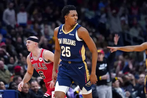 New Orleans Pelicans guard Trey Murphy III (25) reacts after making a slam dunk in the first half of an NBA basketball game against the Chicago Bulls in New Orleans, Wednesday, Nov. 16, 2022. (AP Photo/Gerald Herbert)