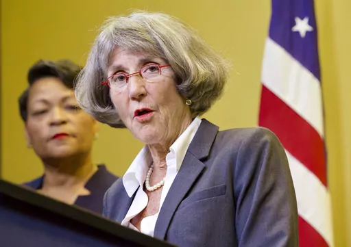 Anne Kirkpatrick speaks during a news conference at City Hall in New Orleans, Monday, Sept. 11, 2023, as Mayor LaToya Cantrell, back left, listens. Kirkpatrick is Cantrell's nominee to head the New Orleans Police Department. (Chris Granger/The Times-Picayune/The New Orleans Advocate via AP)