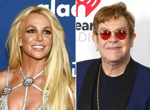 This combination of photos show Britney Spears at the 29th annual GLAAD Media Awards in Beverly Hills, Calif., on April 12, 2018, left, and Elton John at the iHeartRadio Music Awards on Thursday, May 27, 2021, in Los Angeles. Spears and John have collaborated for the first time, creating the slinky, club-ready single "Hold Me Closer" that sees the pop icons take old sounds and fashion something new. (AP Photo)