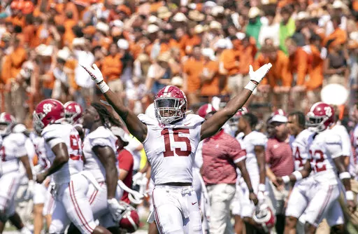 Alabama linebacker Dallas Turner (15) celebrates the end of the game as time runs out for Texas during the second half of an NCAA college football game, Saturday, Sept. 10, 2022, in Austin, Texas. Alabama defeated Texas 20-19. (AP Photo/Rodolfo Gonzalez)
