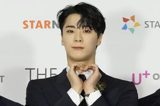 Moon Bin, a member of K-Pop group ASTRO, poses for photos on the red carpet for the 2021 Asia Artist Awards in Seoul, South Korea, Dec. 2, 2021. Moon Bin was found dead at his home in Seoul, his management agency said Thursday, April 20, 2023. (AP Photo/Lee Jin-man, File)