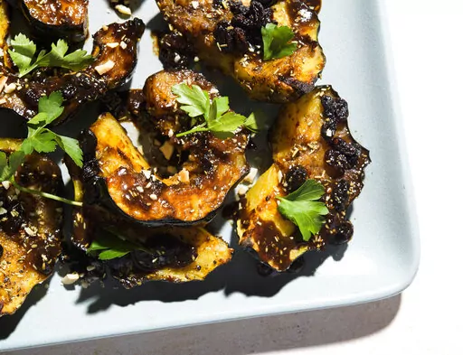 This image released by Milk Street shows a recipe for Agrodolce Acorn. (Milk Street via AP)