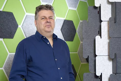 Oren Etzioni poses for photos at the Allen Institute for Artificial Intelligence where he serves as advisor & board member, Friday, Dec. 8, 2023, in Seattle. Experts are warning that the spread of misinformation could get worse in the coming presidential election contest. The safeguards that attempted to counter the bogus claims the last time are eroding, while the tools and systems that create and spread them are only getting stronger. (AP Photo/John Froschauer)
