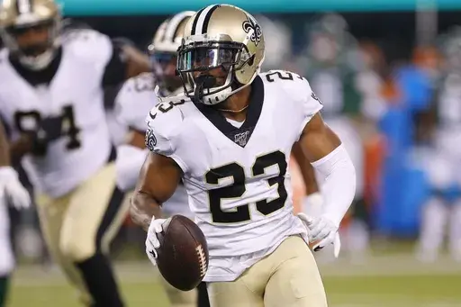 New Orleans Saints' Marshon Lattimore (23) runs back a fumble recovery during the first half of the team's preseason NFL football game against the New York Jets on Saturday, Aug. 24, 2019, in East Rutherford, N.J. (AP Photo/Noah K. Murray, File)