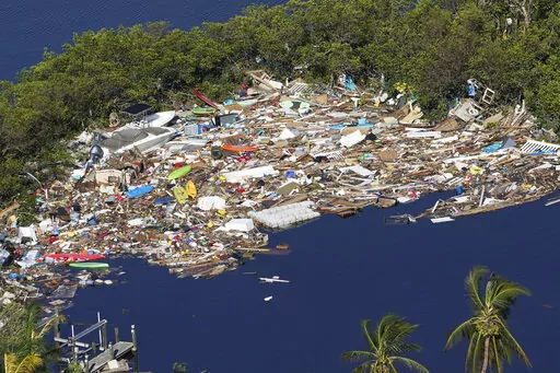 Debris is piled up at the end of a cove following heavy winds and storm surge caused by Hurricane Ian, Sept. 29, 2022, in Barefoot Beach, Fla. Florida has seen an increase in cases of flesh-eating bacteria this year driven largely by a surge in the county hit hardest by Hurricane Ian. The state Department of Health reports that as of Friday there have been 65 cases of vibrio vulnificus infections and 11 deaths in Florida this year. That compares to 34 cases and 10 deaths reported during all of 2
