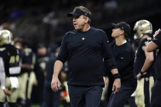 New Orleans Saints head coach Sean Payton walks on the field before an NFL football game against the Carolina Panthers in New Orleans, Jan. 2, 2022. The Carolina Panthers have received permission from the New Orleans Saints to interview Sean Payton for their vacant head coaching position, according to a person familiar with the situation. (AP Photo/Derick Hingle, File)