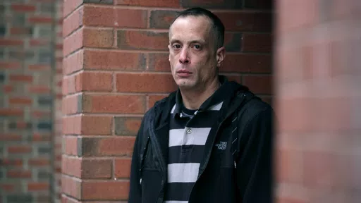 David Meehan, lead plaintiff in a class-action lawsuit accusing the State of New Hampshire of covering up decades of sexual, physical and emotional abuse at its youth detention center, poses for a photo outside his lawyer's office in Portsmouth, N.H., Friday, Jan. 10, 2020. The class-action suit was later dismissed, but Meehan’s individual case goes to trial Tuesday, April 9, 2024, in Rockingham County Superior Court. (AP Photo/Charles Krupa, File)
