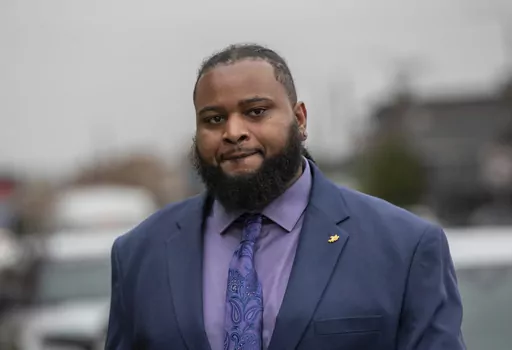 Cardell Hayes walks into the Orleans Parish Criminal District Court for his retrial in New Orleans, Friday, Jan. 26, 2024. Hayes, who shot former New Orleans Saints star Will Smith following a traffic crash nearly eight years ago has been convicted of manslaughter. (David Grunfeld/The Times-Picayune/The New Orleans Advocate via AP)