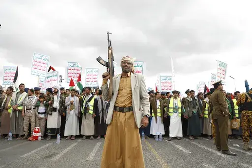 Houthi supporters attend a rally against the U.S.-led airstrikes on Yemen and in support of the Palestinians in the Gaza Strip on Yemen, in Sanaa, Yemen, Friday, Feb. 09, 2024. Despite a month of U.S.-led airstrikes, Yemen's Iranian-backed Houthi rebels have launched attacks seriously damaging a ship in the crucial Bab el-Mandeb Strait and apparently bringing down an American drone worth tens of millions of dollars. (AP Photo/Osamah Abdulrahman, File)