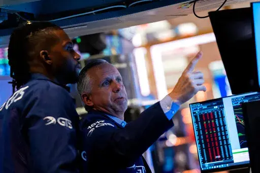 Traders work on the floor of the New York Stock Exchange on Tuesday, Sept. 13, 2022. The stock market fell the most since June 2020, with the Dow loosing more than 1,250 points. (AP Photo/Julia Nikhinson)