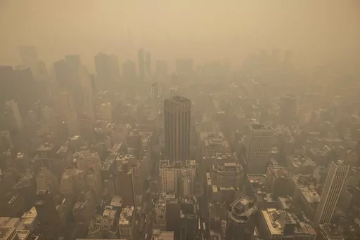 Haze from wildfires in Canada is visible in New York City from the Empire State Building observatory, June 7, 2023, in New York. (AP Photo/Yuki Iwamura, File)