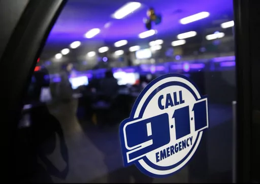 A police 911 call center is pictured on May 3, 2019, in Dallas. Emergency call center workers say their centers are understaffed, struggling to hire new staff and plagued by worker burnout, according to a national survey released Tuesday, July 25, 2023. (Rose Baca/The Dallas Morning News via AP, File)