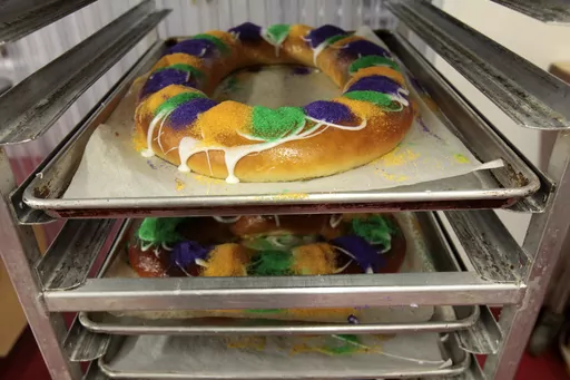 Mardi Gras King Cakes by pastry chef Jean-Luc Albin at Maurice French Pastries are displayed on Feb. 10, 2011, in Metairie, La. A thief stole seven king cakes — about as many as he could carry — during a break-in last week at a New Orleans bakery. The thief also took cash and a case of vodka from Bittersweet Confections last Wednesday, Jan. 24, 2024 according to New Orleans Police Department. (AP Photo/Gerald Herbert, File