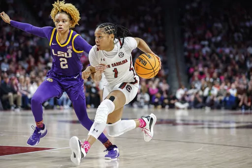 South Carolina guard Zia Cooke (1) drives to the basket against LSU guard Jasmine Carson (2) during the first half of an NCAA college basketball game in Columbia, S.C., Sunday, Feb. 12, 2023. (AP Photo/Nell Redmond)