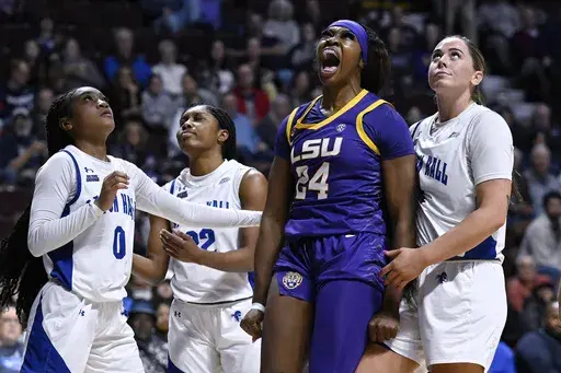 LSU guard Aneesah Morrow (24) reacts after making a basket while being fouled by Seton Hall in the second half of an NCAA college basketball game, Tuesday, Dec. 17, 2024, in Uncasville, Conn. (AP Photo/Jessica Hill)