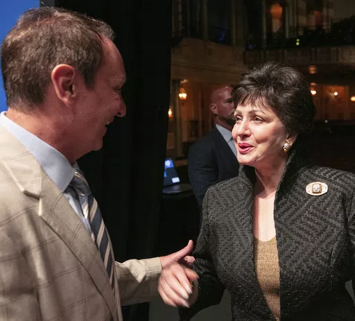 Louisiana Gov. Jeff Landry, left, speaks with New Orleans Saints owner Gayle Benson during a news conference at the Saenger Theater in New Orleans, Tuesday, June 4, 2024, about New Orlean's preparations for hosting NFL football's Super Bowl. (John McCusker/The Times-Picayune/The New Orleans Advocate via AP)