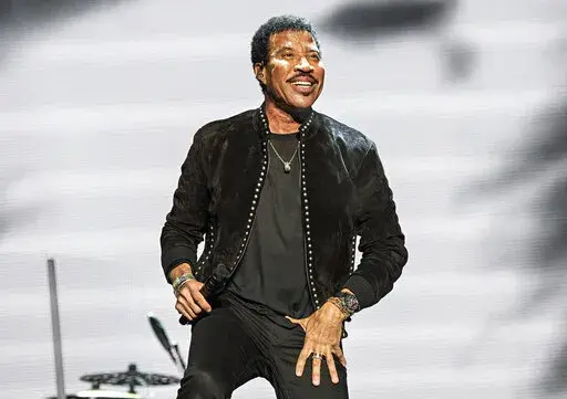 Lionel Richie performs at KAABOO Texas in Arlington, Texas on May 10, 2019. The Library of Congress said Thursday that Richie will receive the national library’s Gershwin Prize for Popular Song. He will be bestowed the prize at an all-star tribute in Washington, D.C., on March 9. (Photo by Amy Harris/Invision/AP, File)