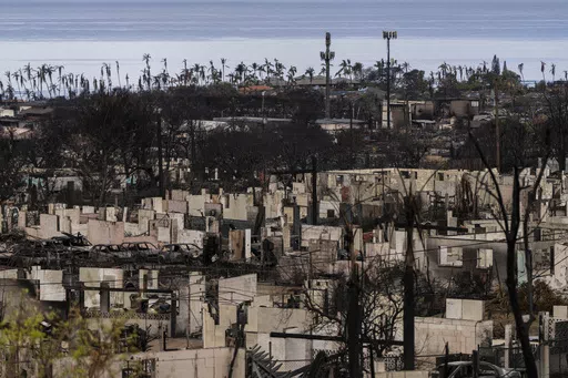 A general view shows the aftermath of a wildfire in Lahaina, Hawaii, Monday, Aug. 21, 2023. The wildfires devastated parts of the Hawaiian island of Maui earlier this month. Maui County is suing major cellular carriers for failing to properly inform police of widespread service outages during the height of last summer's deadly wildfire. (AP Photo/Jae C. Hong, File)