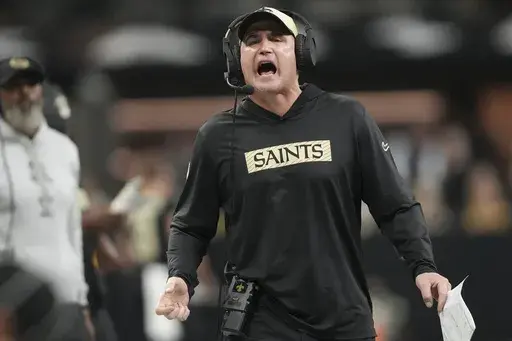 New Orleans Saints interim head coach Darren Rizzi yells on the sideline in the first half of an NFL football game against the Washington Commanders in New Orleans, Sunday, Dec. 15, 2024. (AP Photo/Gerald Herbert)