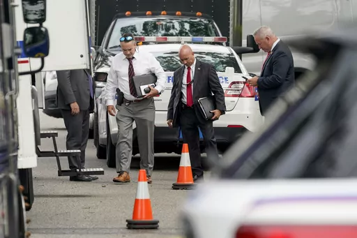 Authorities search the home of suspect Rex Heuermann, Tuesday, July 18, 2023, in Massapequa Park, As new details emerge about how police finally caught the alleged Gilgo Beach serial killer, they've also raised questions about whether investigators adequately pursued a key lead that may have helped solve the case sooner. (AP Photo/John Minchillo, File)