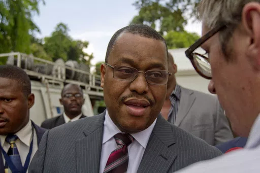 Haiti's then Prime Minister Garry Conille speaks with journalists after a press conference in Port-au-Prince, Oct. 6, 2011. Conille was named Haiti’s new prime minister, Tuesday, May 28, 2024. (AP Photo/Dieu Nalio Chery, File)
