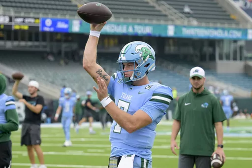 Tulane quarterback Michael Pratt (7) warms up before an NCAA college football game against Tulsa in New Orleans, Saturday, Nov. 11, 2023. (AP Photo/Matthew Hinton)