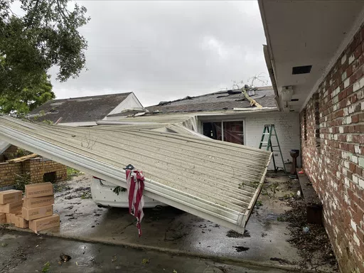 This photo provided by St. James Parish Government shows damage to property after severe weather passed the area on Friday, May 17, 2024 in Romeville, La. Gulf Coast states could experience scattered, severe thunderstorms with tornadoes, large hail and damaging winds. Heavy to excessive rainfall is possible for eastern Louisiana into central Alabama, the National Weather Service said. (Victoria Henry/St. James Parish Government via AP)