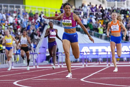 Sydney McLaughlin, of the United States, wins the final of the women's 400-meter hurdles at the World Athletics Championships on July 22, 2022, in Eugene, Ore. World-record setters McLaughlin-Levrone and Armand "Mondo" Duplantis were named World Athletes of the Year on by track's international governing body Monday, Dec. 5, adding yet another achievement to a remarkable 2022 for both athletes. (AP Photo/Ashley Landis, File)