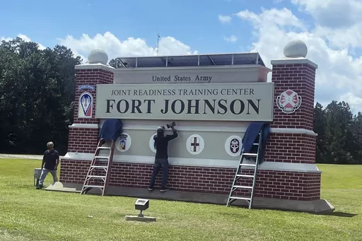 A sign at west Louisiana U.S. Army base displays the base's new name in n Vernon Parish, Louisiana, Tuesday, June 13, 2023. The former Fort Polk on Tuesday formally became Fort Johnson, named for a Black World War I hero. (Crystal Stevenson/The American Press via AP)