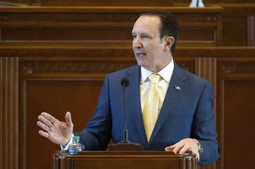 Louisiana Gov. Jeff Landry addresses members of the House and Senate on opening day of a legislative special session, Feb. 19, 2024, in the House Chamber at the State Capitol in Baton Rouge, La. Landry has signed legislation that makes it a crime to knowingly approach within 25 feet (7.6 meters) of a police officer while they are “engaged in law enforcement duties” after the officer has ordered the person to stay back. (Hilary Scheinuk/The Advocate via AP, File)