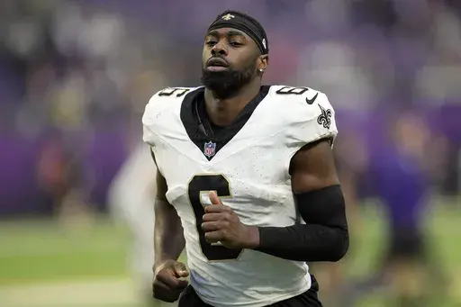 New Orleans Saints safety Marcus Maye jogs off the field after an NFL football game against the Minnesota Vikings, Nov. 12, 2023, in Minneapolis. The Miami Dolphins agreed to sign Maye on Monday, June 10, 2024, a person with knowledge of the negotiations told The Associated Press. The person spoke to the AP on condition of anonymity because the deal had not been announced. (AP Photo/Abbie Parr, File)