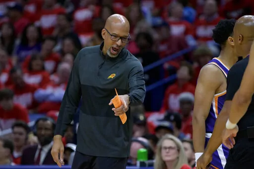 Phoenix Suns head coach Monty Williams argues a call in the first half of Game 4 against the New Orleans Pelicans in an NBA basketball first-round playoff series in New Orleans, Sunday, April 24, 2022. (AP Photo/Matthew Hinton)