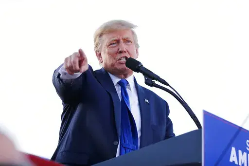 Former President Donald Trump speaks at a rally at the Delaware County Fairgrounds, Saturday, April 23, 2022, in Delaware, Ohio, to endorse Republican candidates ahead of the Ohio primary on May 3. Trump's post-presidency enters a new phase this month as voters across the U.S. begin weighing the candidates he elevated to pursue a vision of a Republican Party steeped in hardline populism, culture wars and denial of his loss in the 2020 campaign. (AP Photo/Joe Maiorana, File)