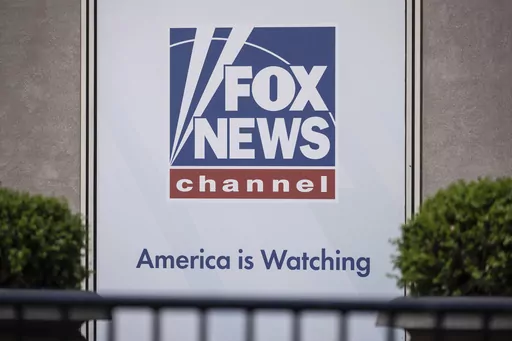 The Fox News logo is displayed outside Fox News Headquarters in New York, April 12, 2023. Former President Donald Trump's decision to back out of Fox News' first GOP primary debate this week likely costs the network a chance at a very large audience for the end of summer. It also tests the network's ability to pivot yet again after what has been a tough year, paying $787 million to settle a defamation lawsuit just as a trial was to begin, and firing popular personality Tucker Carlson shortly aft