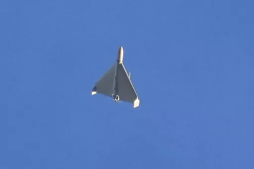 A drone is seen in the sky seconds before it fired on buildings in Kyiv, Ukraine, on Oct. 17, 2022. The Iranian-made drones that Russia sent slamming into central Kyiv this week have produced hand-wringing and consternation in Israel, complicating the country’s balancing act between Russia and the West. (AP Photo/Efrem Lukatsky)