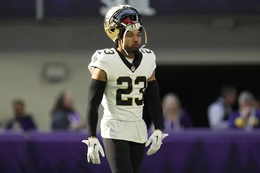 New Orleans Saints cornerback Marshon Lattimore (23) stands on the field before an NFL football game against the Minnesota Vikings, Nov. 12, 2023, in Minneapolis. On Tuesday, Dec. 26, New Orleans Saints coach Dennis Allen all but ruled out the return of top cornerback Lattimore or starting receiver Michael Thomas for the team's game at Tampa Bay on Sunday, Dec. 31. (AP Photo/Abbie Parr, File)