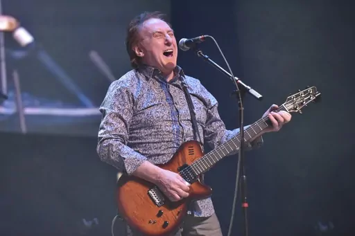 Denny Laine performs, Thursday Jan, 17, 2019, at the Arcada Theatre in St. Charles, Ill. Laine, a British singer, songwriter and guitarist who performed in an early, pop-oriented version of the Moody Blues and was later Paul McCartney’s longtime sideman in the ex-Beatle’s solo band Wings, died Tuesday, Dec. 5, 2023, his wife said in a social media post. (Photo by Rob Grabowski/Invision/AP, File)