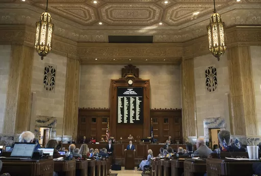 Louisiana Gov. Jeff Landry addresses members of the House and Senate on opening day of a legislative special session focusing on crime, Feb. 19, 2024, in the House Chamber at the State Capitol in Baton Rouge, La. Louisiana’s Republican-controlled Senate has advanced a bill Monday, April 8, that would empower state and local law enforcement to arrest and jail people in the state who enter the U.S. illegally, similar to embattled legislation in Texas. (Hilary Scheinuk/The Advocate via AP)