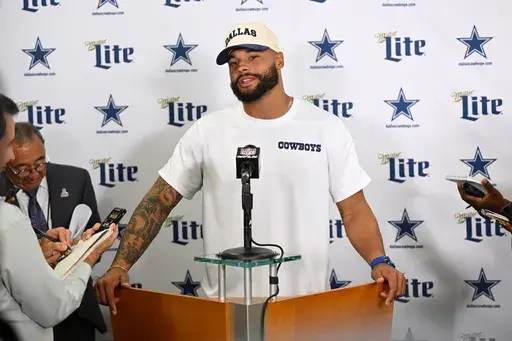 Dallas Cowboys' Dak Prescott responds to questions during a news conference after the team's NFL football game against the Cleveland Browns in Cleveland, Sunday, Sept. 8, 2024. (AP Photo/David Richard)