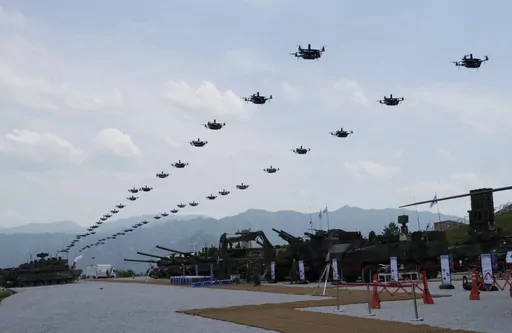 The South Korean army's drones fly during South Korea-U.S. joint military drills at Seungjin Fire Training Field in Pocheon, South Korea, Thursday, May 25, 2023. The South Korean and U.S. militaries held massive live-fire drills near the border with North Korea on Thursday, despite the North's warning that it won't tolerate what it calls such a hostile invasion rehearsal on its doorstep. (AP Photo/Ahn Young-joon)
