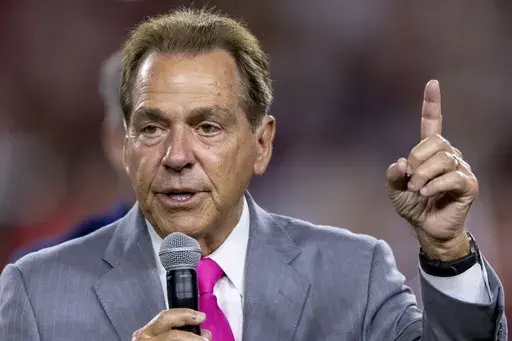 Former Alabama head football coach Nick Saban thanks the crowd during a stadium renaming ceremony at halftime of an NCAA college football game between South Florida and Alabama, Saturday, Sept. 7, 2024, in Tuscaloosa, Ala. (AP Photo/Vasha Hunt, File)